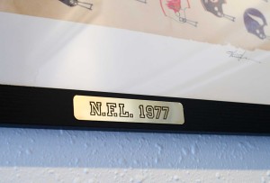 Detail of mounted print in black frame